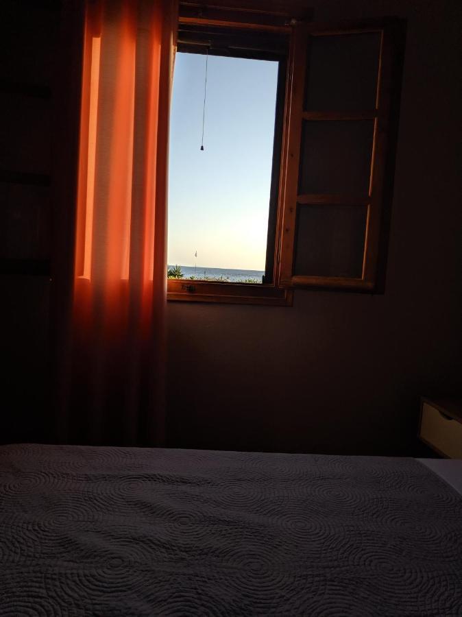 Tramonto Nel Delfini Leilighet Kini Eksteriør bilde
